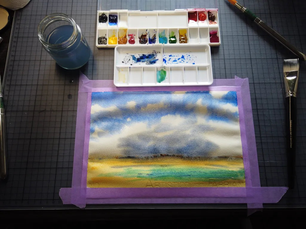 How to sketch a cloudy sky with watercolors